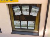 Schloss Dachau posters in window